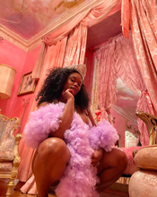 Load image into Gallery viewer, Pictured here is a model wearing a lavender Tulle Boa 
